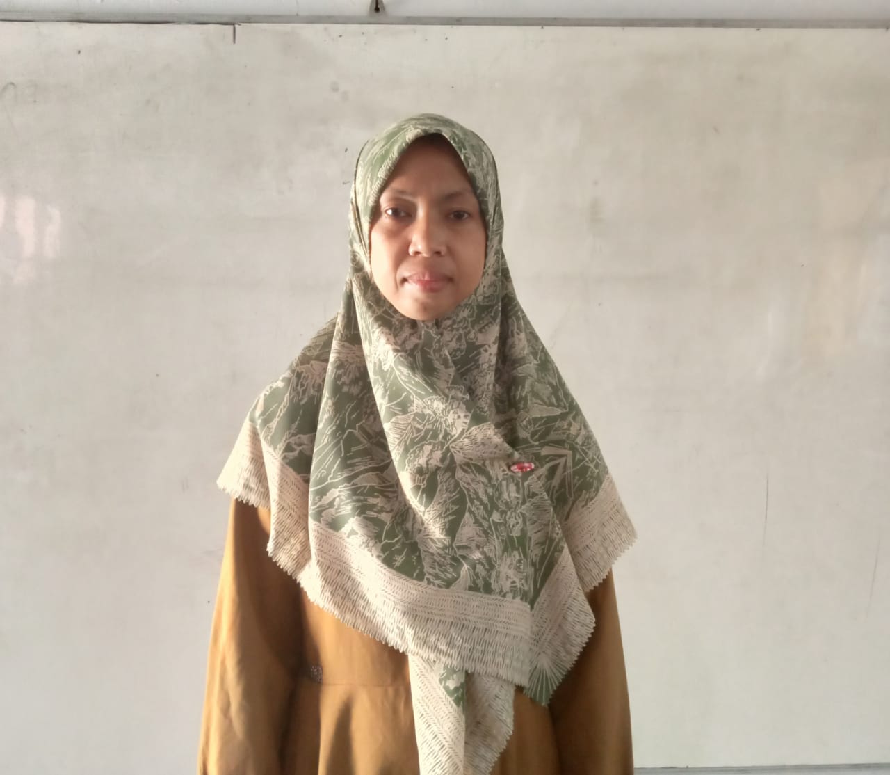 Hasni, S.Pd