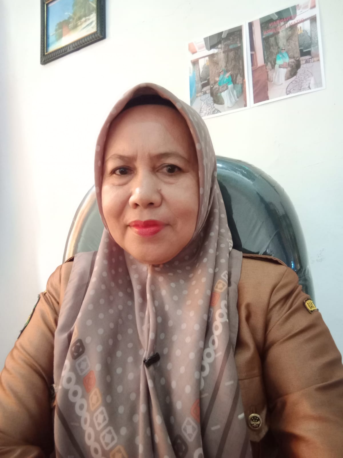 Hj. Rohani,S.Pd.MM